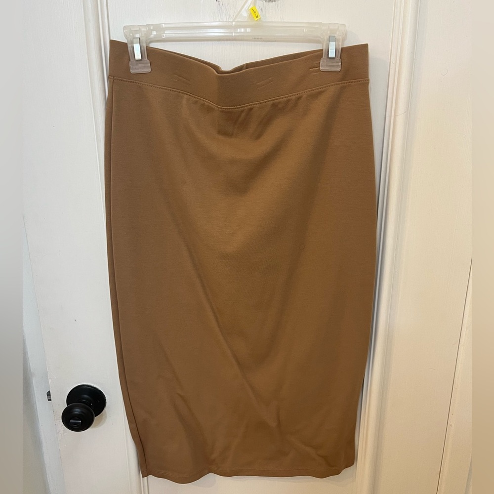 Light brown colored mid length skirt Size L